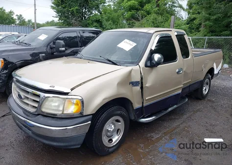 2000 Ford F150 из США, поврежденный, VIN 1FTRX17L0YNA64787